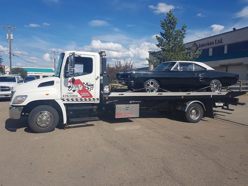 Equipment hauling & auto transport tilt deck service - Service de remorquage à Edmonton (AB) | AutoDir